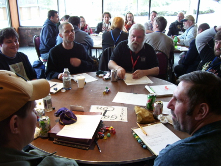 Frank Mentzer at work at the gaming table.