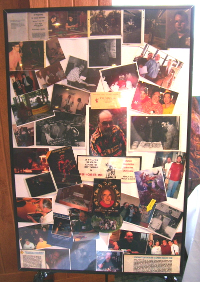 Gary’s Memorial Poster. Note the original TSR business card above the center photo.