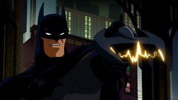 Batman fires Batarang