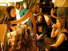 Reading/Singing/Mead-Drinking party at ReaderCon 2009 (Photo by Alex Daley McFarlane)