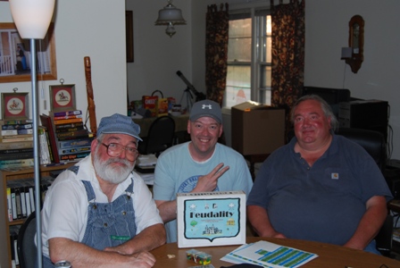 Tom Wham, me, and Ernie Gygax at a gaming table... PEACE OUT!