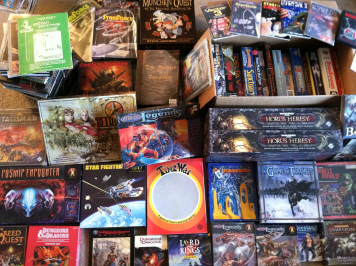 2012-games-auction2 Some of the treasures I brought home from the Spring Games Plus auction.