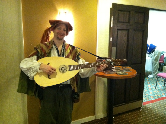 Dan the Bard entertains gamers in the halls with funny and original songs