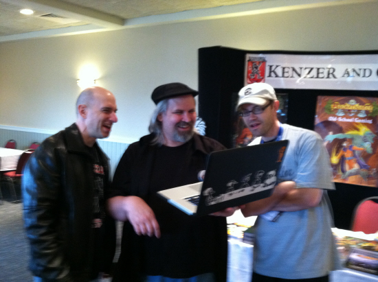 Dave Kenzer, Jolly Blackburn and Steve Johansson share a laugh at the KenzerCo booth.