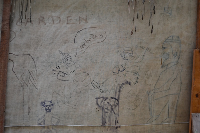 On the back wall, the painters doodled some more humorous pictures, poking fun at the Germans and the looming war.