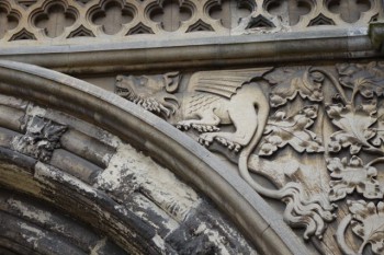 Medieval dragon guarding the gate to Norwich Cathedral.