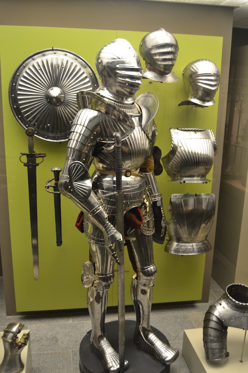 Arms and armor from the 16th century, mostly of German manufacture. The "Maximilian" style suit in the center was made in Germany c. 1510-1530.