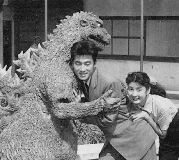 The_Original_Godzilla_Hugs_two_Japanese_People