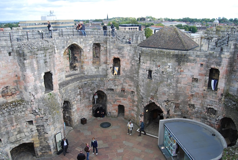 The castle interior, as seen from the top of the wall. Originally this was covered by a roof.