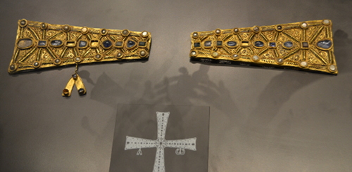Fragments of a cross from the Guarrazar Hoard. A sketched reconstruction is below.