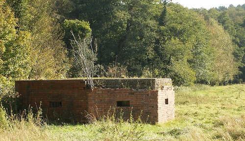 Many pillboxes were concrete faced with brick, as can be seen with this example near Waverley Abbey, Farnham, England. Photo courtesy Steve Parker via flickr.