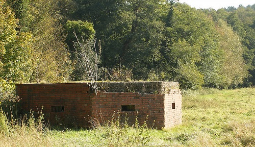 Many pillboxes were concrete faced with brick, as can be seen with this example near Waverley Abbey, Farnham, England. Photo courtesy Steve Parker via flickr. 