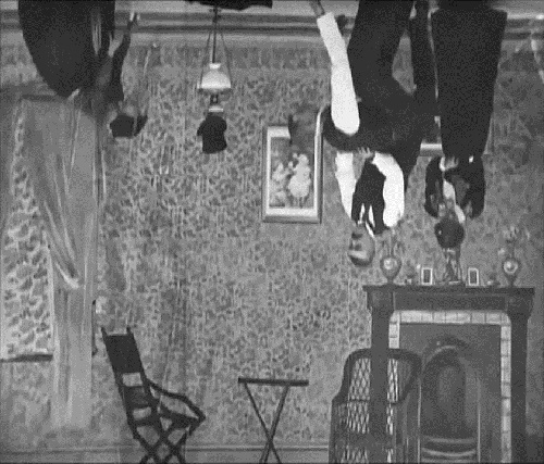 Dancing on the ceiling in Upside Down, or The Human Flies (1899).