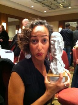 Sofia Samatar with the World Fantasy Award. Photo by Nathan Ballingrud.