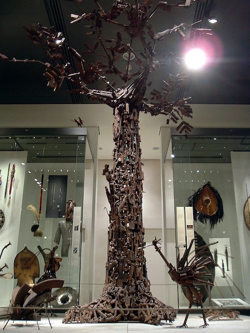 Tree of Life, designed by a group of artists from Mozambique from weapons traded in for tools. Image courtesy John from Tejas, via Wikimedia Commons.