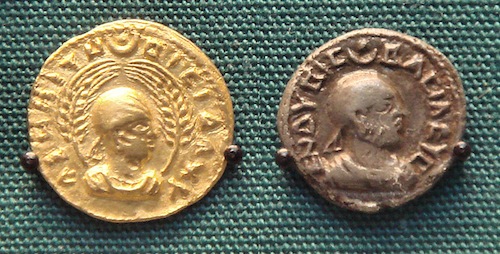 Coins of King Endybis (ruled 227–35 AD). The left one reads in Greek "AΧWMITW BACIΛEYC", "King of Aksum". The right one reads in Greek: ΕΝΔΥΒΙC ΒΑCΙΛΕΥC, "King Endybis". Photo courtesy Wikimedia Commons.