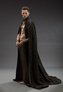 Spooky sparkly cape, check. Gratuitous shirtlessness, check. Chiseled cheekbones, check.