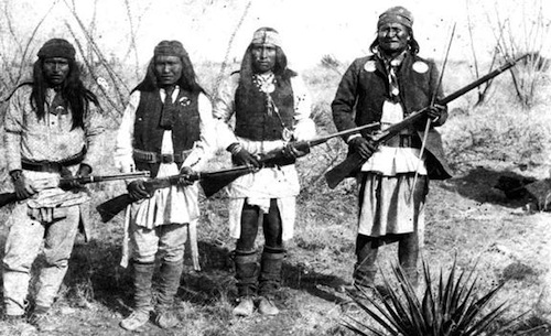 Geronimo (right) and some of his warriors at their final surrender in 1886.