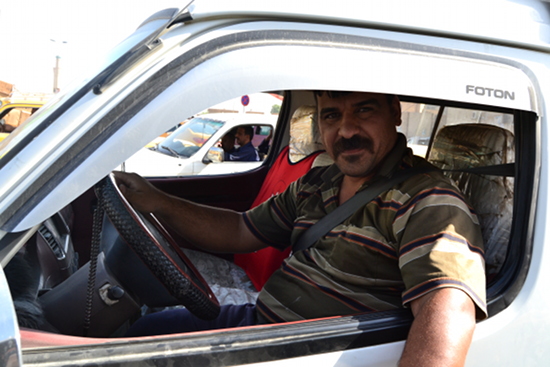 While stuck in Baghdad traffic (a common occurrence) this guy pulled up next to my van, did a double take when he saw me, then shook my hand, welcomed me to Iraq, and told me to take his photo.
