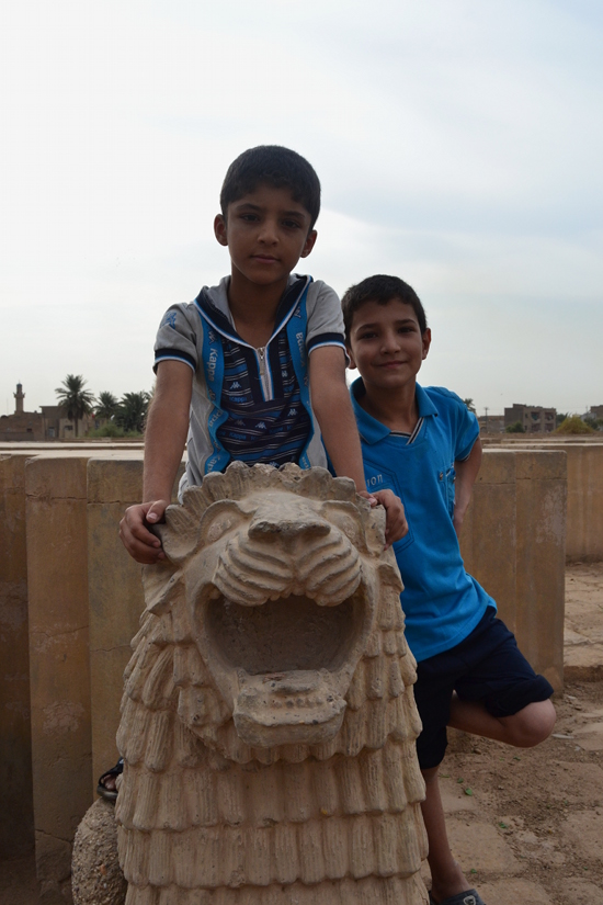 Kids goofing around at the Hermal archaeological site on the outskirts of Baghdad.