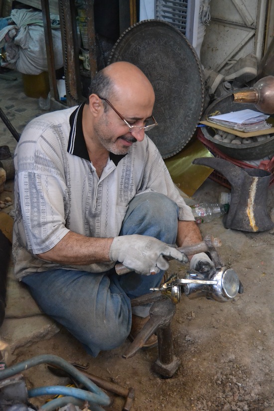 Metalworker in the Baghdad souk.