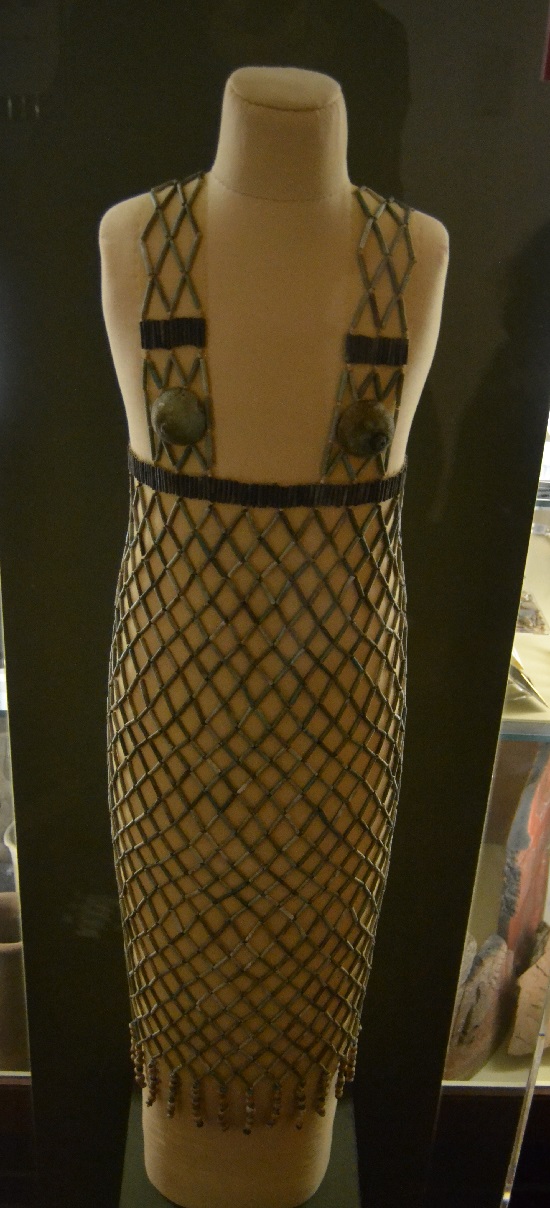 One of the prizes of the collection is this dancer's bead-net dress. Each of the 127 shells around the fringe are plugged with a small stone so that they rattled when the wearer moved..