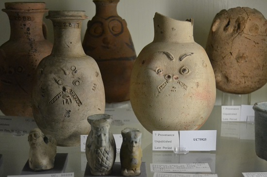 Vessels form the Late Period (c.712 - 332 BC) with faces that may depict the god Bes.