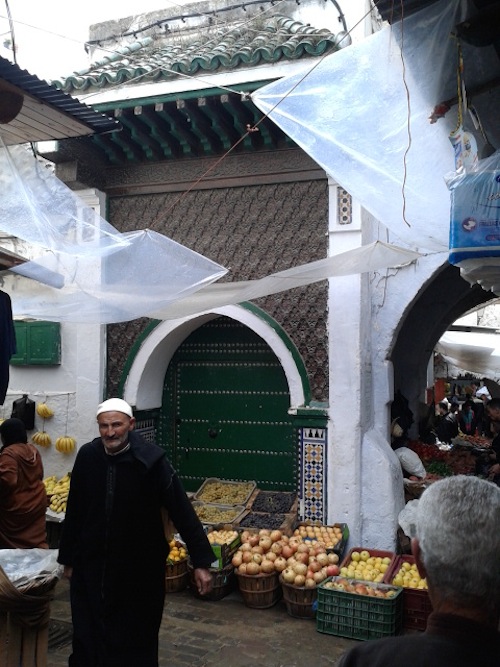 The narrow streets hide some lovely bits of old Islamic architecture. This is the door to the Saqia al-Fouqia Mosque, built 1608. The plastic sheeting got in the way of a lot of my photos, but it helped keep me dry.