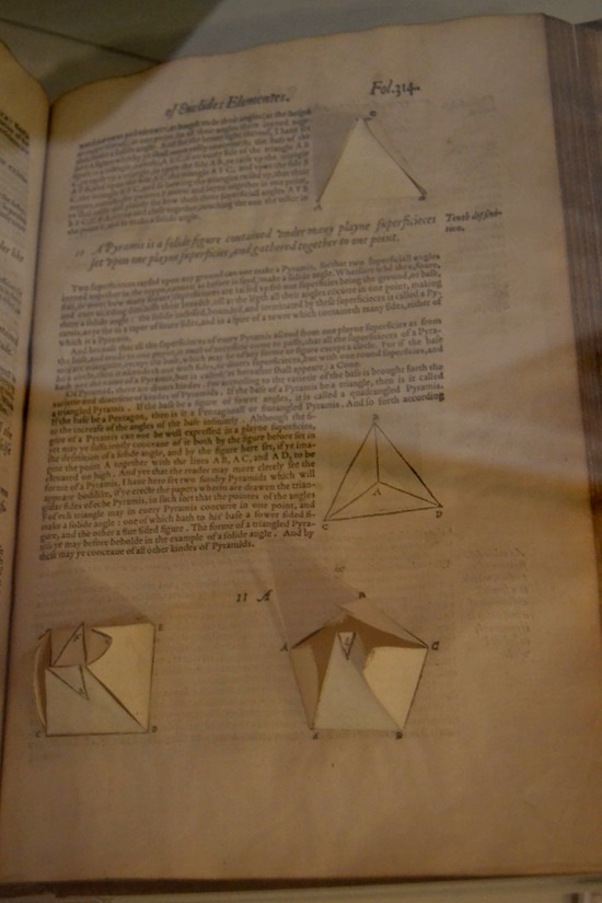 Dee's copy of Euclid's Elements of Geometry, in a 1570 edition that was the first English translation. Dee wrote the preface to this edition, which featured templates for making geometric cutouts that could be pasted into the pages.