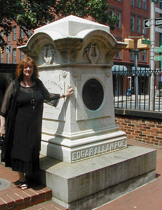 Nancy next to Poe's monument